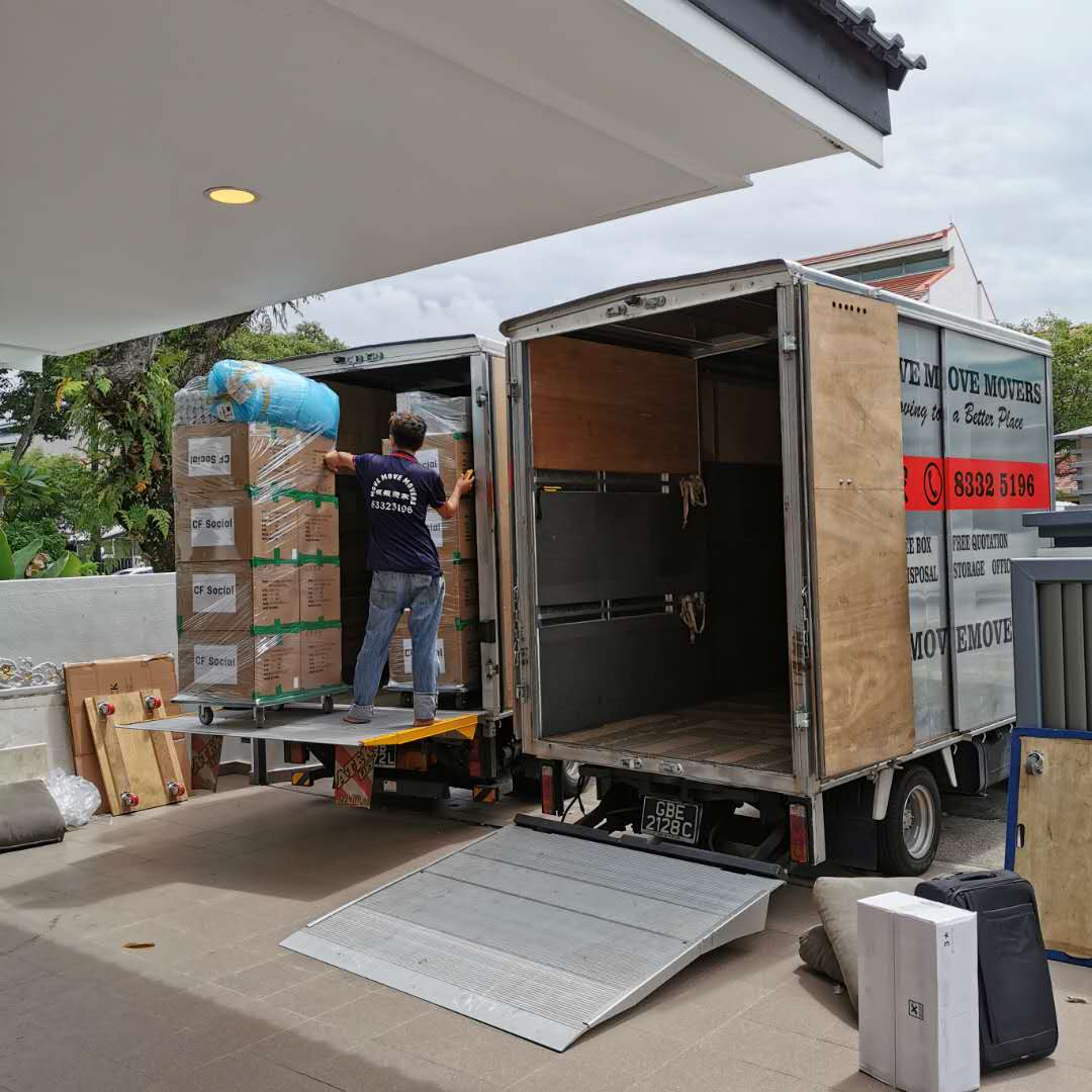 Palletised carton loading - move move movers – move move movers – move move movers Move Move Movers loading palletised carton stacks into a moving truck with a tailgate