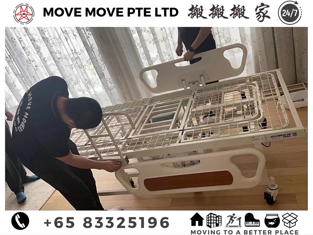 Move Move Movers crew handling a hospital bed during a Singapore healthcare equipment move