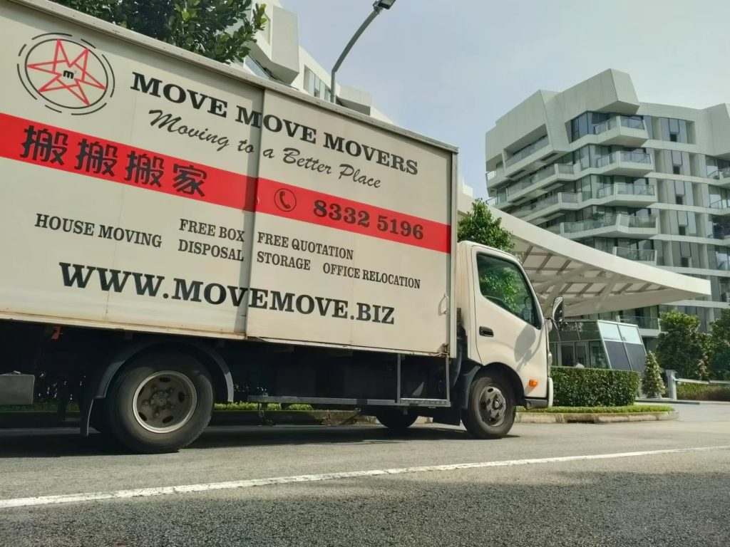 Move Move Movers truck parked outside a condominium in Singapore before a residential move
