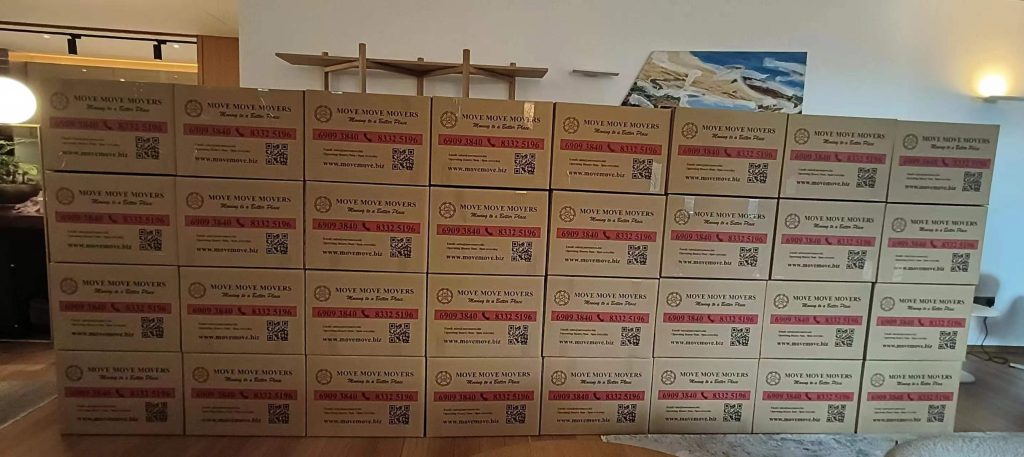 Organised moving cartons and packing boxes prepared for a house move in Singapore