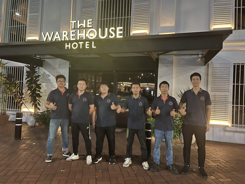 The warehouse hotel at night – move move movers – move move movers Exterior of The Warehouse Hotel lit up at night.