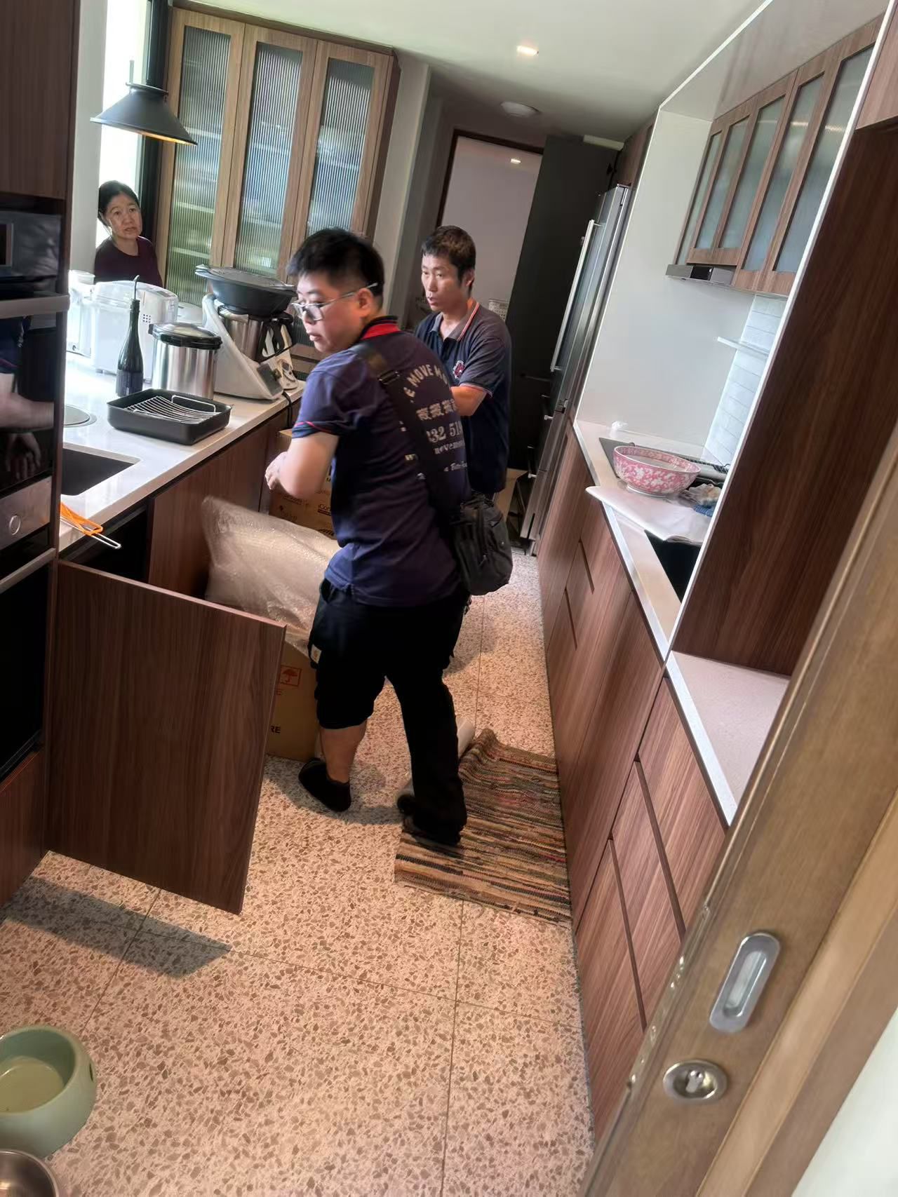 Large packing and move team executing a Singapore relocation project