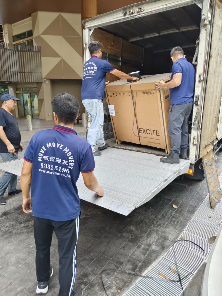 Move Move Movers crew loading boxed Technogym equipment at ActiveSG in Singapore