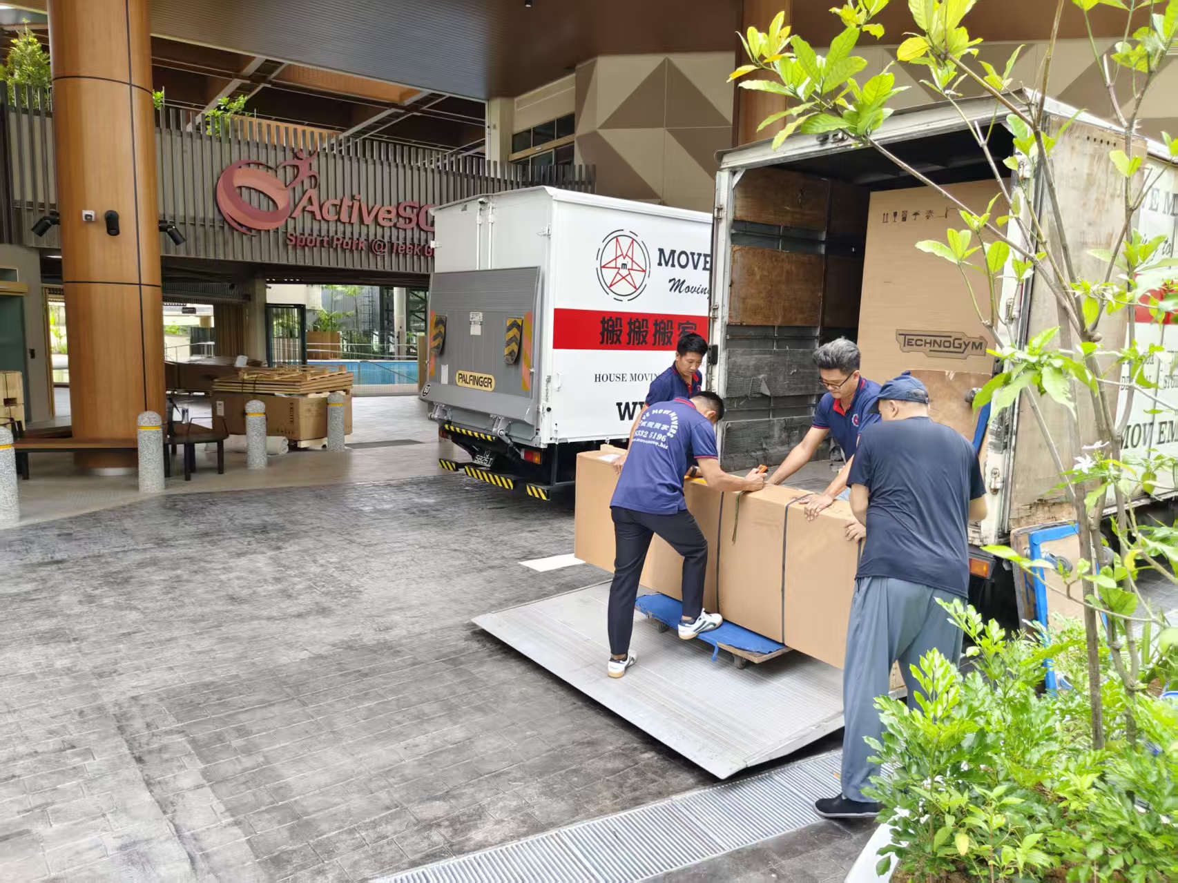 Crew staging oversized equipment transfer