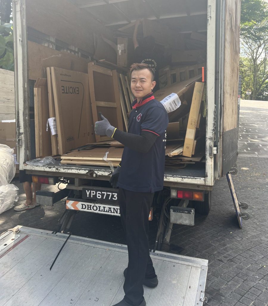 Move Move Movers branded lorry and moving crew during a Singapore moving job
